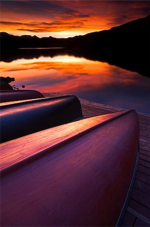 simsearch:841-06034119,k - Lined up canoes reflect the colours of a stunning sunset, Canada, North America Stock Photo - Rights-Managed, Code: 841-05962062