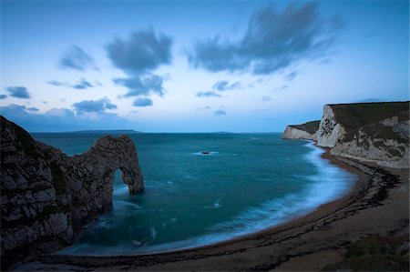 simsearch:841-06034119,k - Dawn atop the cliffs at Durdle Door, Jurassic Coast, UNESCO World Heritage Site, Dorset, England, United Kingdom, Europe Stock Photo - Rights-Managed, Code: 841-05962134