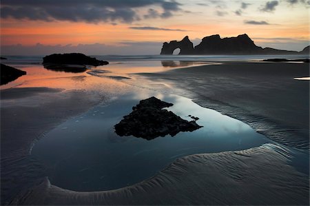simsearch:841-06034119,k - Sunrise on Wharariki Beach at the top of the South Island, New Zealand, Pacific Stock Photo - Rights-Managed, Code: 841-05962211