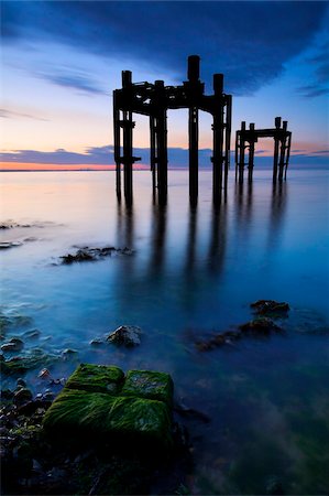 Remains of a D-Day embarkation pier at Lepe Beach, New Forest National Park, Hampshire, England, United Kingdom, Europe Stock Photo - Rights-Managed, Code: 841-05962293