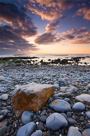 pebbles on shore - Sunset over the Atlantic from the pebbly shores of Sandymouth, Cornwall, England, United Kingdom, Europe Stock Photo - Rights-Managed, Code: 841-05962459