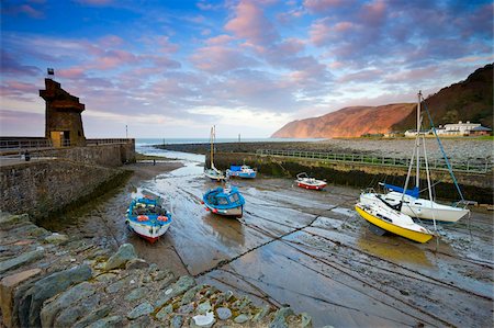 seawall - Low tide in Lynmouth Harbour, Exmoor National Park, Devon, England, United Kingdom, Europe Stock Photo - Rights-Managed, Code: 841-05962513