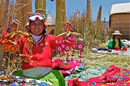peru and culture - Portrait of a Uros Indian woman selling souvenirs, Islas Flotantes (Floating Islands), Lake Titicaca, Peru, South America Stock Photo - Rights-Managed, Code: 841-06034488