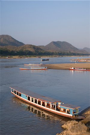 simsearch:841-02946821,k - Boats on the Mekong River, Luang Prabang, Laos, Indochina, Southeast Asia, Asia Stock Photo - Rights-Managed, Code: 841-06031663