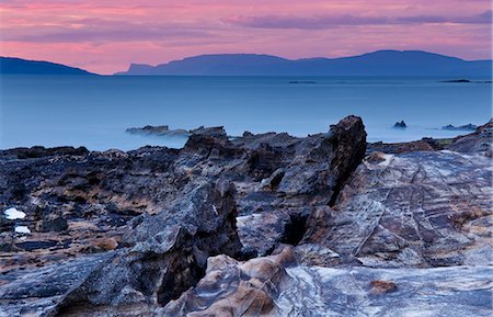 Sunset over Skye from the Isle of Eigg, Inner Hebrides, Scotland, United Kingdom, Europe Stock Photo - Rights-Managed, Code: 841-06033831