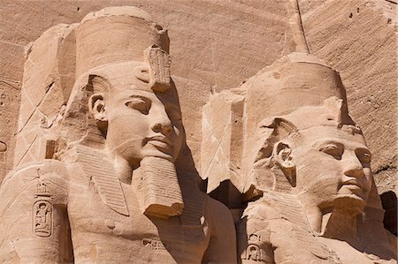 simsearch:841-06033889,k - Giant heads of Ramesses II at the Temple of Re-Herakhte at Abu Simbel, UNESCO World Heritage Site, Nubia, Egypt, North Africa, Africa Stock Photo - Rights-Managed, Code: 841-06033852