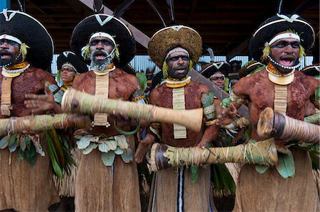 simsearch:841-02946648,k - Colourfully dressed and face painted local tribes celebrating the traditional Sing Sing in the Highlands of Papua New Guinea, Pacific Stock Photo - Rights-Managed, Code: 841-06344080