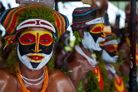 simsearch:841-02946648,k - Colourfully dressed and face painted local tribes celebrating the traditional Sing Sing in the Highlands of Papua New Guinea, Pacific Stock Photo - Rights-Managed, Code: 841-06344081