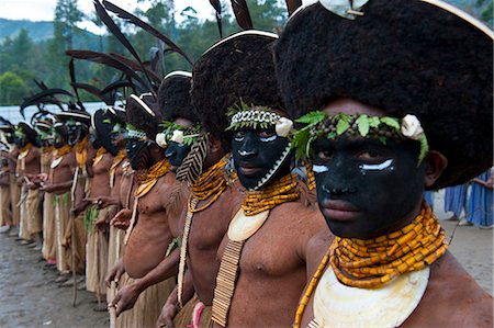 simsearch:841-02946648,k - Colourfully dressed and face painted local tribes celebrating the traditional Sing Sing in the Highlands of Papua New Guinea, Pacific Stock Photo - Rights-Managed, Code: 841-06344082