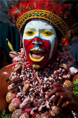 simsearch:841-02946648,k - Colourfully dressed and face painted local tribes celebrating the traditional Sing Sing, Mount Hagen, Highlands of Papua New Guinea Stock Photo - Rights-Managed, Code: 841-06344094
