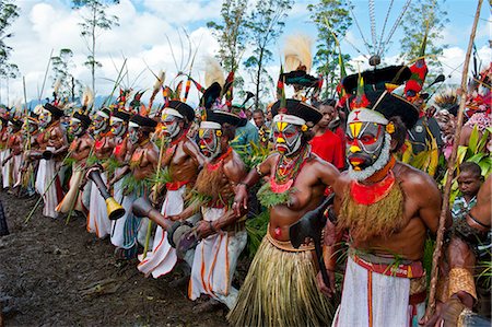 simsearch:841-02946648,k - Colourfully dressed and face painted local tribes celebrating the traditional Sing Sing in the Highlands of Papua New Guinea, Pacific Stock Photo - Rights-Managed, Code: 841-06344101