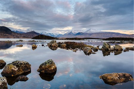 simsearch:841-06449943,k - Snow covered mountains at dawn, Lochan na h Achlaise, Rannoch Moor, Argyll and Bute, Scottish Highlands, Scotland Stock Photo - Rights-Managed, Code: 841-06345384
