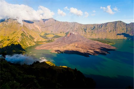 Mount Rinjani caldera, Segara Anak lake and the active volcano, Gunung Baru, Lombok, Indonesia, Southeast Asia, Asia Stock Photo - Rights-Managed, Code: 841-06341150