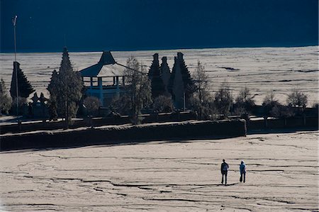 Tourists walking across the Sea of Sand to Pura Luhur Poten, a Hindu Temple at Mount Bromo, Tengger Caldera, East Java, Indonesia, Southeast Asia, Asia Stock Photo - Rights-Managed, Code: 841-06341199