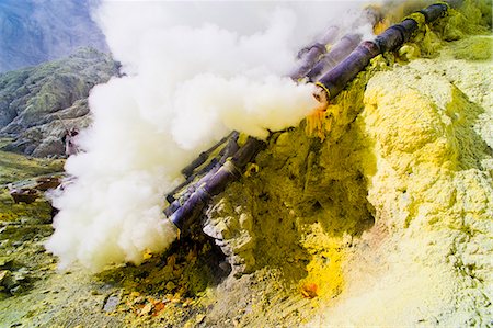 pipe (industry) - Toxic sulphur fumes escaping from the ceramic pipes at Kawah Ijen, Java, Indonesia, Southeast Asia, Asia Stock Photo - Rights-Managed, Code: 841-06341204