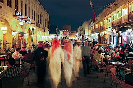 The restored Souq Waqif with mud rendered shops and exposed timber beams, Doha, Qatar, Middle East Stock Photo - Rights-Managed, Code: 841-06343075