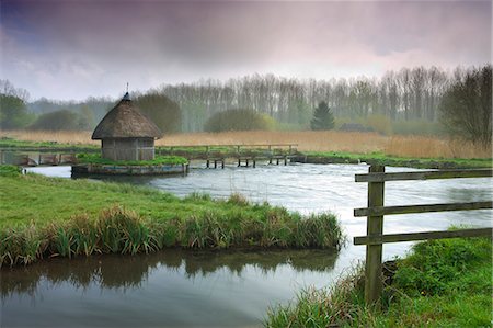 simsearch:841-06343474,k - Thatched fisherman's hut and eel traps spanning the River Test near Leckford, Hampshire, England, United Kingdom, Europe Stock Photo - Rights-Managed, Code: 841-06343466