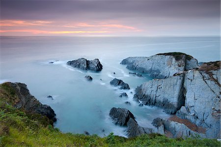 simsearch:600-05803652,k - Sunset over Oreweed Cove on the Morte Point peninsula, North Devon, England, United Kingdom, Europe Stock Photo - Rights-Managed, Code: 841-06343538