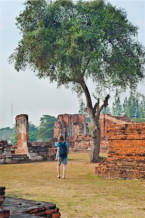simsearch:841-06444990,k - Tourist sightseeing at temple Ruins at Wat Mahathat, Ayutthaya, UNESCO World Heritage Site, Thailand, Southeast Asia Stock Photo - Rights-Managed, Code: 841-06445006