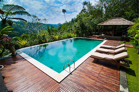 Swimming pool area at luxury accommodation near Ubud, Bali, Indonesia, Southeast Asia, Asia Stock Photo - Rights-Managed, Code: 841-06445023
