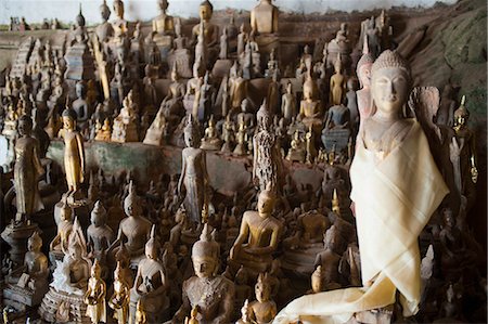 Hundreds of Buddhas at Pak Ou Caves, Luang Prabang, Laos, Indochina, Southeast Asia, Asia Stock Photo - Rights-Managed, Code: 841-06445125