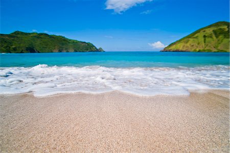 White sands, blue sea and blue sky at Mawun Beach in the South of Lombok, Indonesia, Southeast Asia, Asia Stock Photo - Rights-Managed, Code: 841-06445144