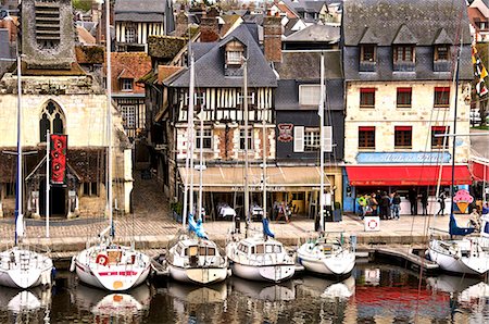 The Vieux Bassin, Old Town, the Naval Museum housed in ancient Saint Etienne church on the left, and boats moored along the quay, Honfleur, Calvados, Normandy, France, Europe Stock Photo - Rights-Managed, Code: 841-06445934