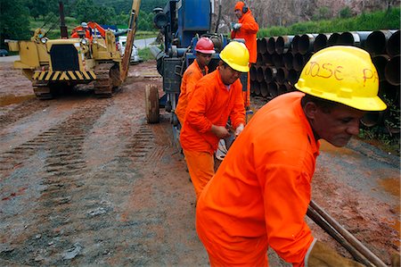 pipe (industry) - Workers putting pipes for natural gas near Congonhas, Minas Gerais, Brazil, South America Stock Photo - Rights-Managed, Code: 841-06446484