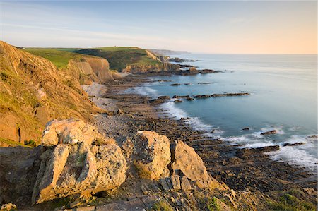 simsearch:841-07081935,k - Clifftop vista of Blegberry Bay and Hartland Quay from Damehole Point, Hartland, Devon, England, United Kingdom, Europe Stock Photo - Rights-Managed, Code: 841-06447468