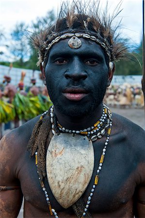 Colourfully dressed and face painted local tribes celebrating the traditional Sing Sing in the Highlands, Papua New Guinea, Pacific Stock Photo - Rights-Managed, Code: 841-06448190