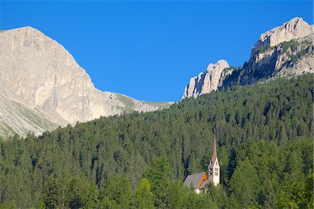 simsearch:841-06446529,k - Church overlooked by Ciampedie Mountains, Vigo di Fassa, Fassa Valley, Trento Province, Trentino-Alto Adige/South Tyrol, Italian Dolomites, Italy, Europe Stock Photo - Rights-Managed, Code: 841-06448883