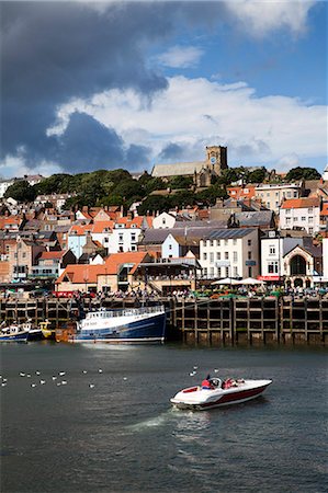 Speedboat entering the Harbour at Scarborough, North Yorkshire, Yorkshire, England, United Kingdom, Europe Stock Photo - Rights-Managed, Code: 841-06449164