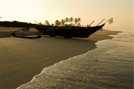 Sunrise over traditional fishing boat and beach, Benaulim, Goa, India, Asia Stock Photo - Rights-Managed, Code: 841-06449384