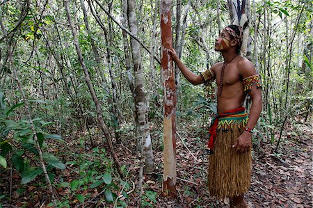 Pataxo Indian man walking at the Reserva Indigena da Jaqueira near Porto Seguro, Bahia, Brazil, South America Stock Photo - Rights-Managed, Code: 841-06500542