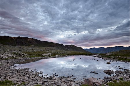 Clouds reflected in a tarn at Stony Pass, San Juan National Forest, Colorado, United States of America, North America Stock Photo - Rights-Managed, Code: 841-06500736