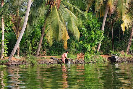 rivers of india - Lady washing pan in the river in the Backwaters, Kerala, India, Asia Stock Photo - Rights-Managed, Code: 841-06501025