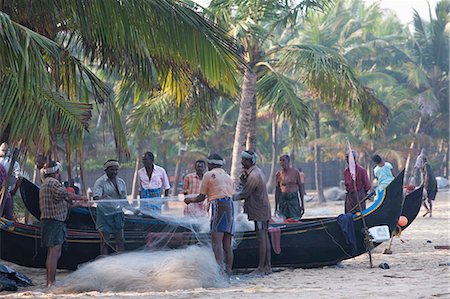 Fishermen sorting their nets at Marari Beach, Kerala, India, Asia Photographie de stock - Rights-Managed, Code: 841-06501030