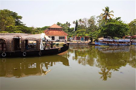 Traditional Kettuvallom (private houseboat) travelling along the Kerala Backwaters, Kerala, India, Asia Stock Photo - Rights-Managed, Code: 841-06501033