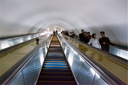 escalator - Punhung station, one of the many 100 metre deep subway stations on the Pyongyang subway network, Pyongyang, Democratic People's Republic of Korea (DPRK), North Korea, Asia Stock Photo - Rights-Managed, Code: 841-06501230