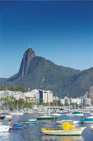 simsearch:841-02709392,k - Boats moored in harbour with Christ the Redeemer statue in background, Urca, Rio de Janeiro, Brazil, South America Stock Photo - Rights-Managed, Code: 841-06501520