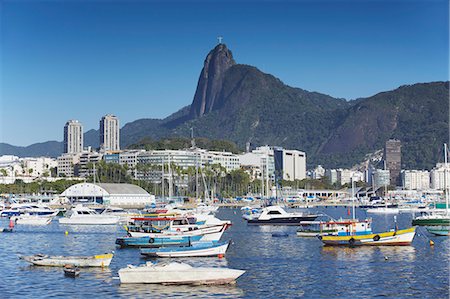 simsearch:841-02709392,k - Boats moored in harbour with Christ the Redeemer statue in background, Urca, Rio de Janeiro, Brazil, South America Stock Photo - Rights-Managed, Code: 841-06501521