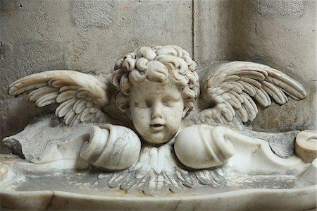 stereotypical french - The 17th century holy water font, St. Germain l'Auxerrois church, Paris, France, Europe Stock Photo - Rights-Managed, Code: 841-06502112