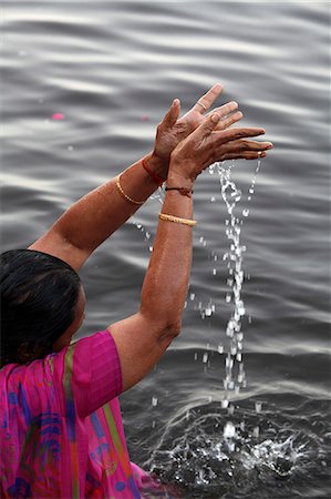 Hindu woman praying in the Yamuna River, Mathura, Uttar Pradesh, India, Asia Stock Photo - Rights-Managed, Code: 841-06502190