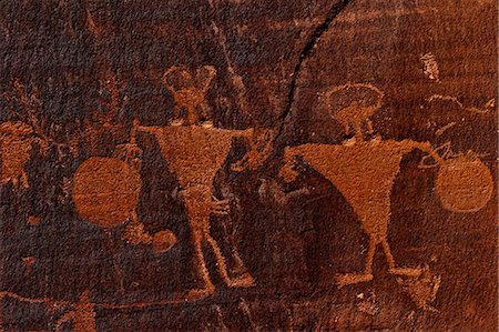 Horned anthropomorphs holding shields, Formative Period Petroglyphs, Utah Scenic Byway 279, Potash Road, Moab, Utah, United States of America, North America Stock Photo - Rights-Managed, Code: 841-06502748