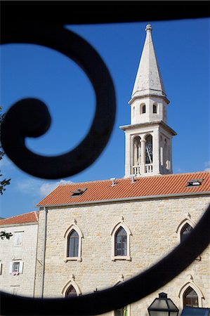 Church belltower viewed through wrought iron railings of the Old Town, Bidva, Montenegro, Europe Stock Photo - Rights-Managed, Code: 841-06502917