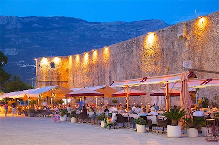 eating outside restaurant - Old Town at night, Budva, Montenegro, Europe Stock Photo - Rights-Managed, Code: 841-06502929
