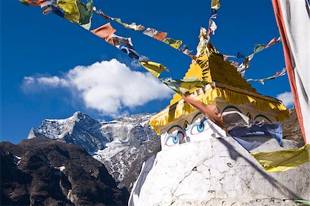 religious temples - Prayer flags and Buddhist stupa, Namche Bazaar, Solu Khumbu Region, Nepal, Himalayas, Asia Stock Photo - Rights-Managed, Code: 841-06503113