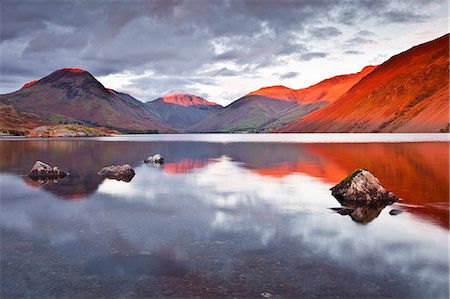 simsearch:841-06447444,k - The Scafell range across the reflective waters of Wast Water in the Lake District National Park, Cumbria, England, United Kingdom, Europe Stock Photo - Rights-Managed, Code: 841-06503315