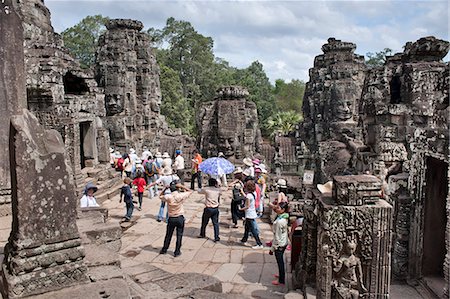 Tourists at The Bayon, Angkor Thom, Angkor, UNESCO World Heritage Site, Siem Reap, Cambodia, Indochina, Southeast Asia, Asia Stock Photo - Rights-Managed, Code: 841-06503387