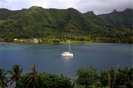 A cruise catamaran in the bay of Hamanee in Tahaa, French Polynesia, Pacific Islands, Pacific Stock Photo - Rights-Managed, Code: 841-06807074